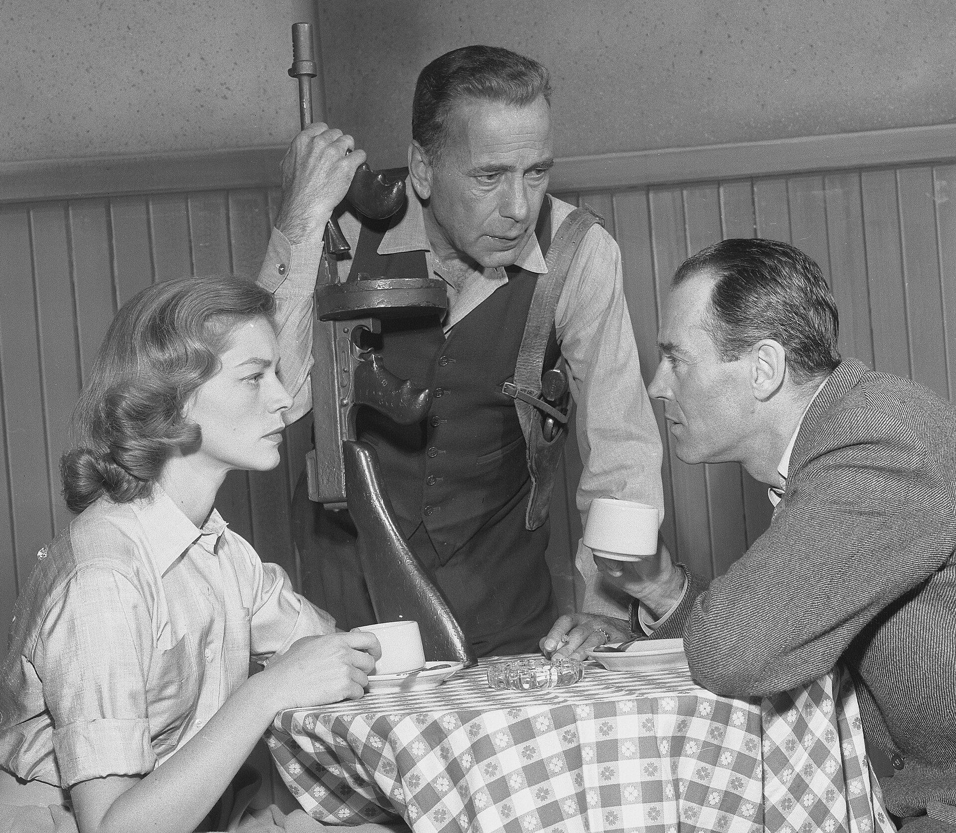 Lauren Bacall and Humphrey Bogart photographed at an event in May 1955