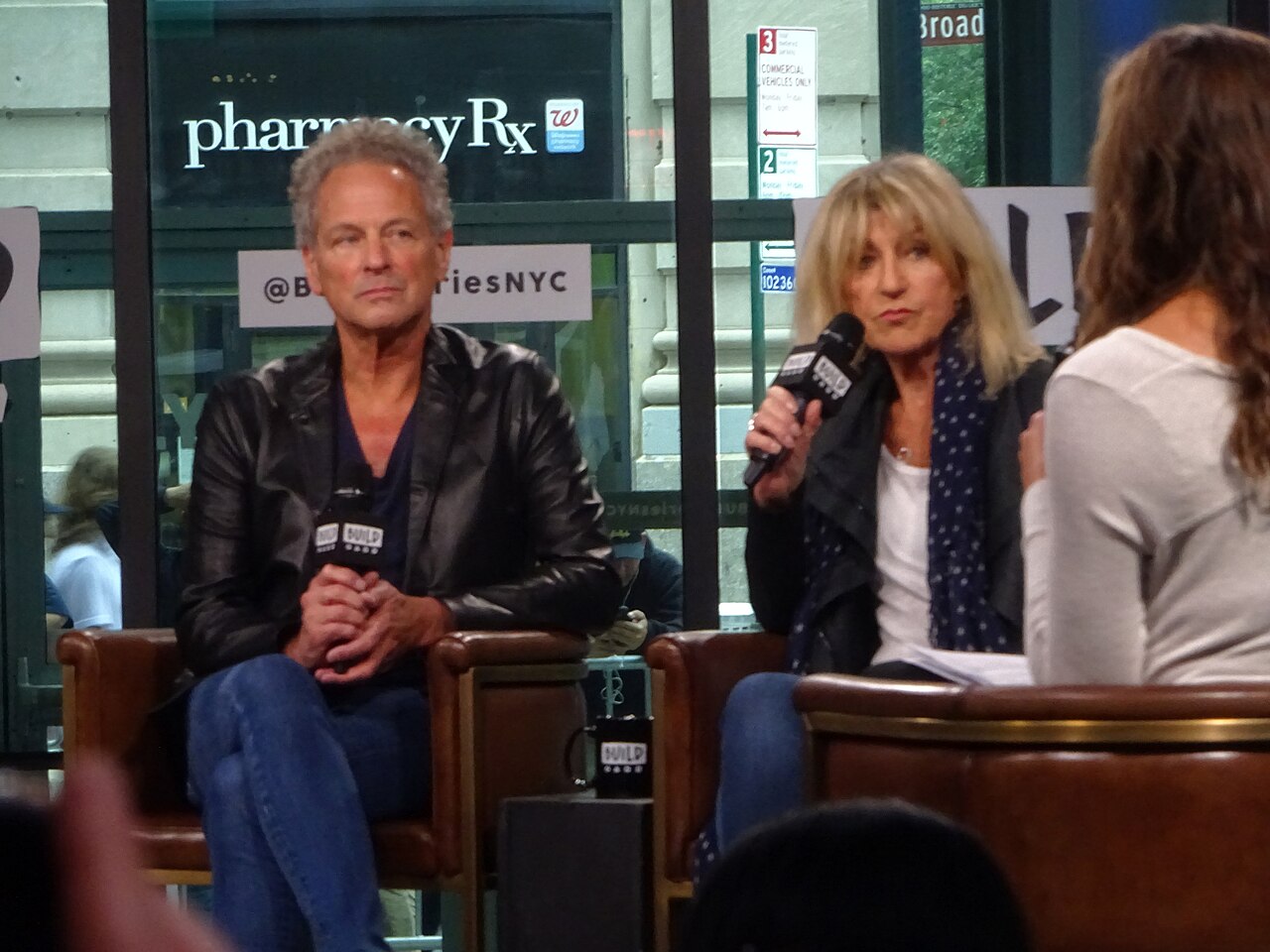 Lindsey Buckingham and Christine McVie seated together during a live interview in New York in June 2017