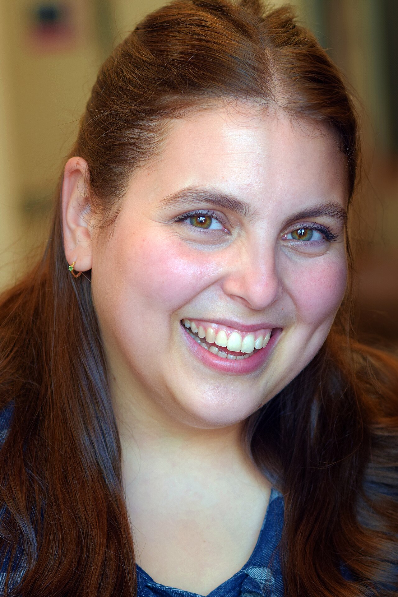 Beanie Feldstein photographed at a public appearance in 2024