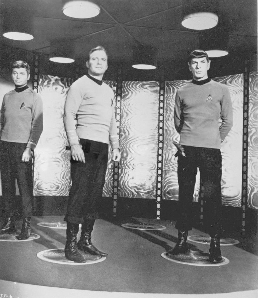 DeForest Kelley, William Shatner and Leonard Nimoy in the transporter room in a 1968 Star Trek publicity photograph